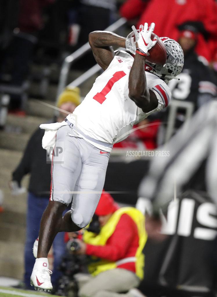 Michael Conroy Ohio State wide receiver Johnnie Dixon (1) makes a catch in the end zone for a touchdown against Purdue during the second half of an NCAA college football game in West Lafayette, Ind., Saturday, Oct. 20, 2018. Purdue defeated Ohio State 49-20. (AP Photo/Michael Conroy)