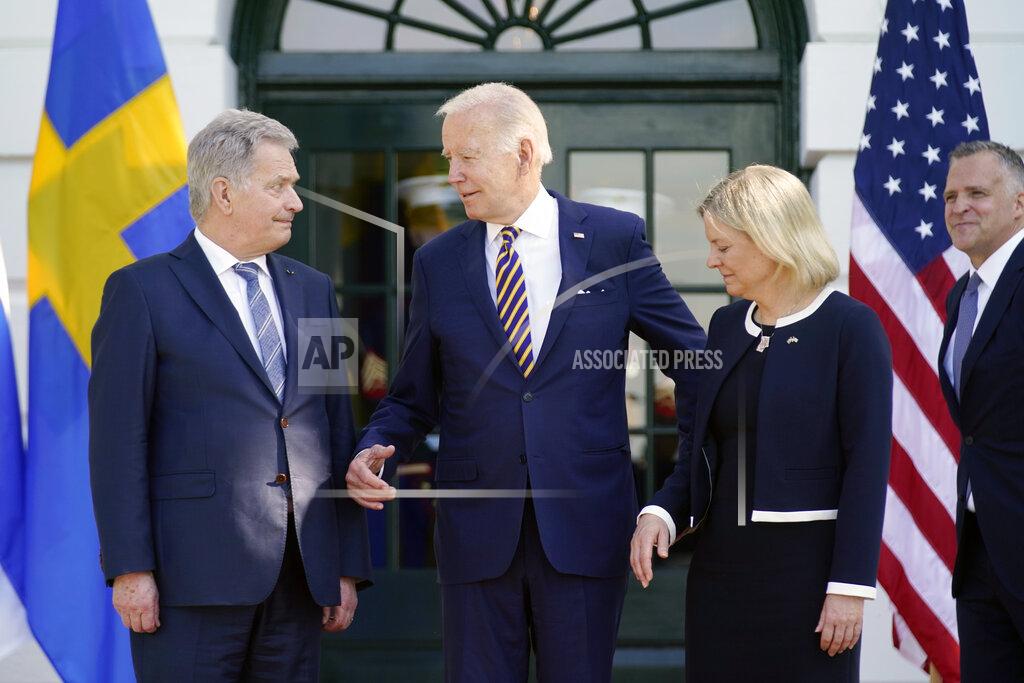 Andrew Harnik President Joe Biden greets Prime Minister Magdalena Andersson of Sweden and President Sauli Niinisto of Finland as they arrive at the White House in Washington, Thursday, May 19, 2022. (AP Photo/Andrew Harnik)