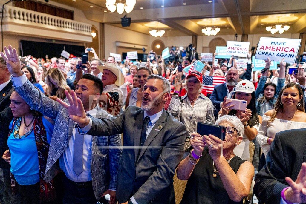 Andrew Harnik Supporters react as President Donald Trump speaks at a Latinos for Trump Coalition roundtable at Arizona Grand Resort & Spa, Monday, Sept. 14, 2020, in Phoenix. (AP Photo/Andrew Harnik)