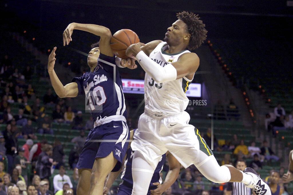 Jerry Larson Baylor forward Freddie Gillespie (33) and Jackson State guard Cainan McClelland (10) reach for the loose ball in the first half of an NCAA college basketball game, Monday, Dec. 30, 2019, in Waco, Texas. (AP Photo/Jerry Larson)