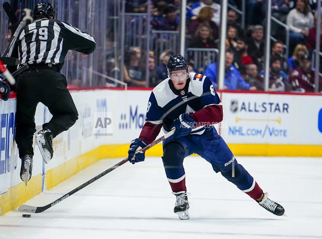 Jack Dempsey FILE - In this Thursday, Jan. 2, 2020, file photo Colorado Avalanche defenseman Cale Makar skates against the St. Louis Blues during the third period of an NHL hockey game in Denver. Bonding between veterans and youngsters has been a time-honored tradition in hockey, with older players routinely inviting rookies to live with them during their first season. That’s the way it was for Avalanche defenseman Cale Makar, who bunked with the family of teammate Matt Calvert when he first arrived before last season. This season, though, is just different. (AP Photo/Jack Dempsey, File)