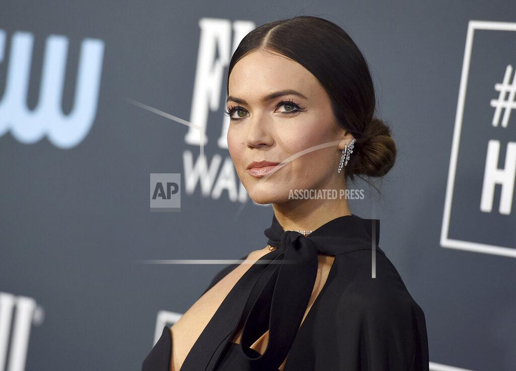 Jordan Strauss FILE - Mandy Moore arrives at the 25th annual Critics' Choice Awards in Santa Monica, Calif. on Jan. 12, 2020, Moore announced the birth of her first child, a son named August Harrison Goldsmith, on her Instagram Tuesday. “Gus is here,” Moore wrote in the post along with a photo. This is the first child for Moore and husband Taylor Goldsmith, a musician she married in 2018. (Photo by Jordan Strauss/Invision/AP, File)