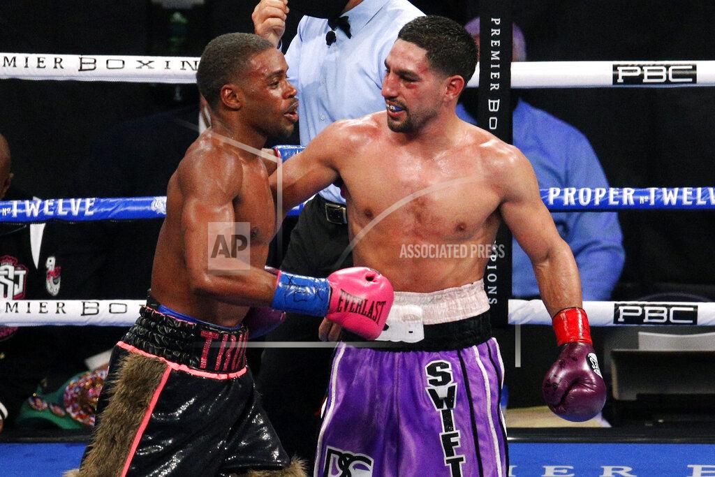 Brandon Wade Errol Spence Jr. and Danny Garcia, right, talk after their WBC an IBF welterweight championship boxing bout in Arlington, Texas, Saturday, Dec. 5, 2020. Spence won the fight. (AP Photo/Brandon Wade)