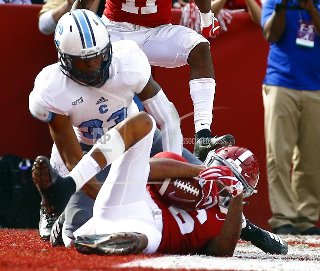 Butch Dill Alabama wide receiver DeVonta Smith (6) catches a pass for a touchdown as Citadel defensive back Ronald Peterkin (33) defended during the second half of an NCAA college football game, Saturday, Nov. 17, 2018, in Tuscaloosa, Ala. (AP Photo/Butch Dill)