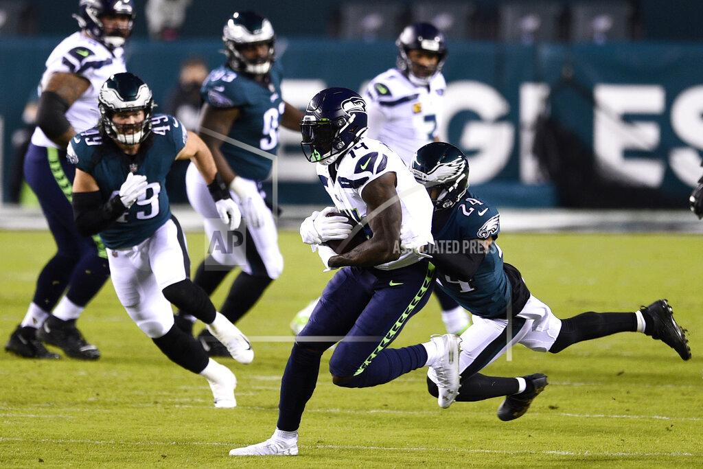 Derik Hamilton Seattle Seahawks' DK Metcalf, left, is tackled by Philadelphia Eagles' Darius Slay during the first half of an NFL football game, Monday, Nov. 30, 2020, in Philadelphia. (AP Photo/Derik Hamilton)