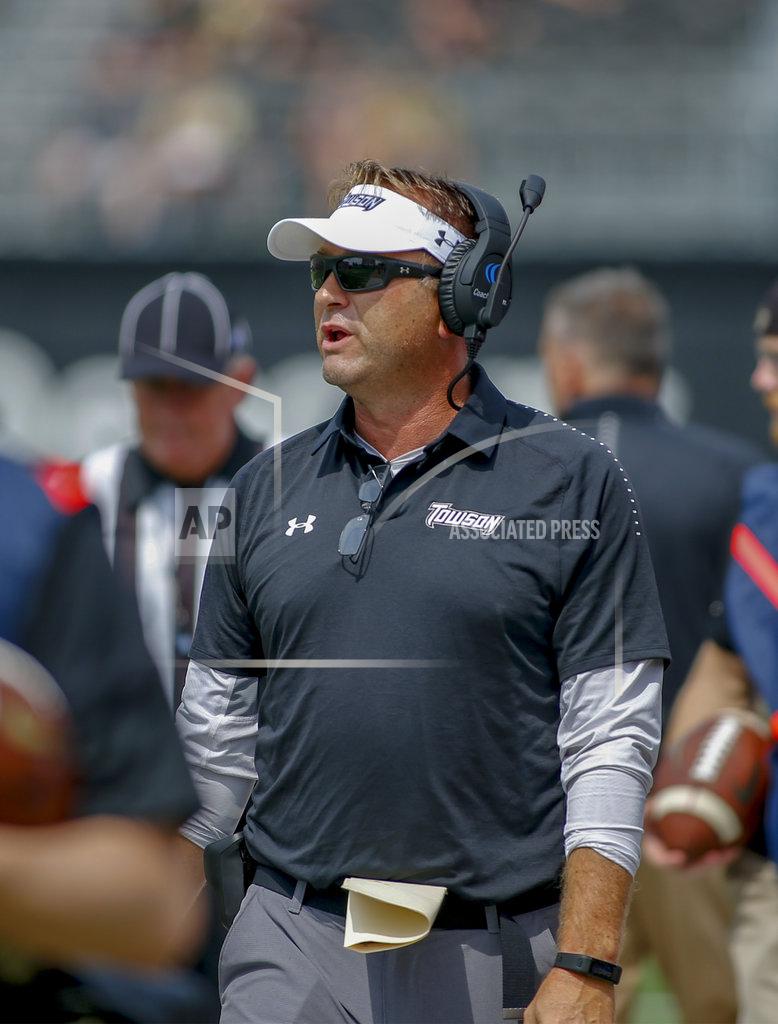 Nell Redmond Towson coach Rob Ambrose walks the sidelines in the first half of an NCAA college football game against Wake Forest in Winston-Salem, N.C., Saturday, Sept. 8, 2018. (AP Photo/Nell Redmond)