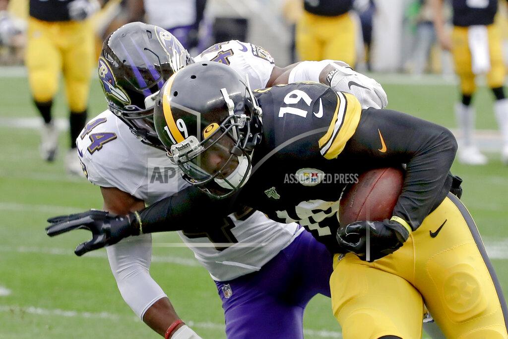 Don Wright Pittsburgh Steelers wide receiver JuJu Smith-Schuster (19) gets away from Baltimore Ravens cornerback Marlon Humphrey (44) on his way to scoring a touchdown in the first half of an NFL football game, Sunday, Oct. 6, 2019, in Pittsburgh. (AP Photo/Don Wright)