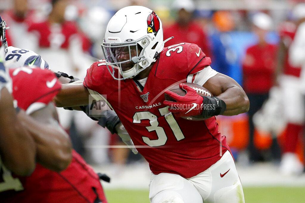 Rick Scuteri Arizona Cardinals running back David Johnson (31) runs against the Seattle Seahawks during the first half of an NFL football game, Sunday, Sept. 29, 2019, in Glendale, Ariz. (AP Photo/Rick Scuteri)