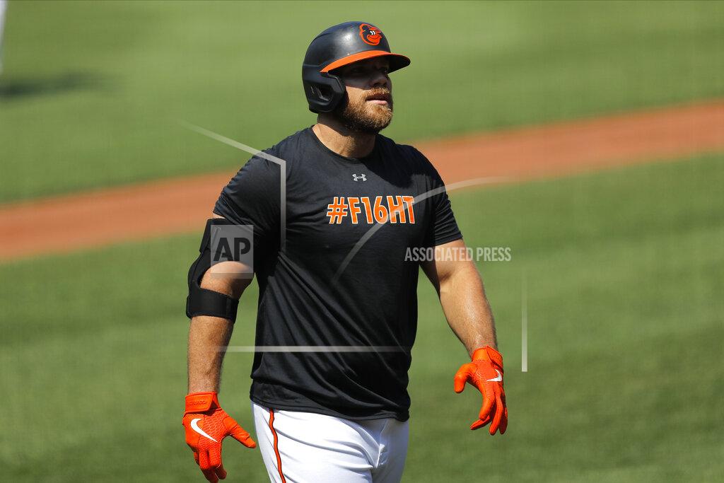 Julio Cortez FILE - In this Friday, July 3, 2020, file photo, Baltimore Orioles' Chris Davis walks away after after batting during baseball training camp in Baltimore. (AP Photo/Julio Cortez, File)