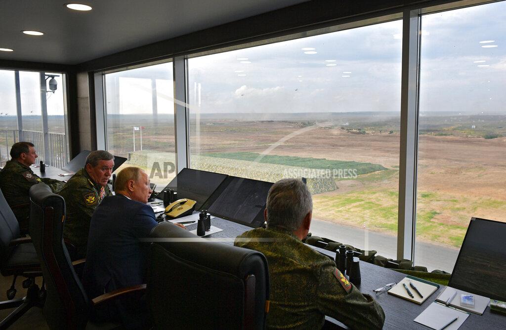 Alexei Druzhinin Russian President Vladimir Putin, second right, Russian Defense Minister Sergei Shoigu, right, and Russian General Staff Valery Gerasimov, second left, watch the joint strategic exercise of the armed forces of the Russian Federation and the Republic of Belarus Zapad-2021 at the Mulino training ground in the Nizhny Novgorod region, Russia, Monday, Sept. 13, 2021. The military drills attend by servicemen of military units and divisions of the Western Military District, representatives of the leadership headquarters and personnel of military contingents of the armed forces of Armenia, Belarus, India, Kazakhstan, Kyrgyzstan and Mongolia. (Alexei Druzhinin, Sputnik, Kremlin Pool Photo via AP)