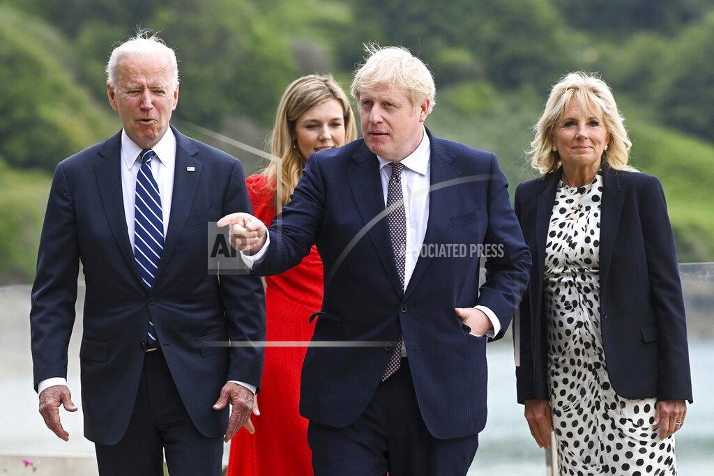 Toby Melville From left: US President Joe Biden, Carrie Johnson, Britain's Prime Minister Boris Johnson and First Lady Jill Biden walk outside Carbis Bay Hotel in Cornwall, Britain, Thursday June 10, 2021. (Toby Melville/Pool Photo via AP)