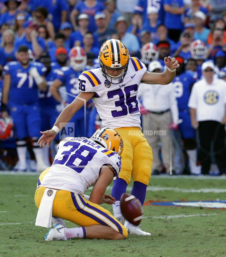 John Raoux FILE - In this Oct. 6, 2018, file photo, LSU place kicker Cole Tracy (36) kicks a field goal against Florida during the first half of an NCAA college football game, in Gainesville, Fla. LSU (6-1, 3-1 SEC) takes on Mississippi State (4-2, 1-2) on Saturday, Oct. 20. If the game is a close, defensive struggle, LSU likes its chances with kicker Cole Tracy, a transfer from Division II Assumption College. He is 17-for-19 on field goals this season and 5-for-5 last week. (AP Photo/John Raoux, File)
