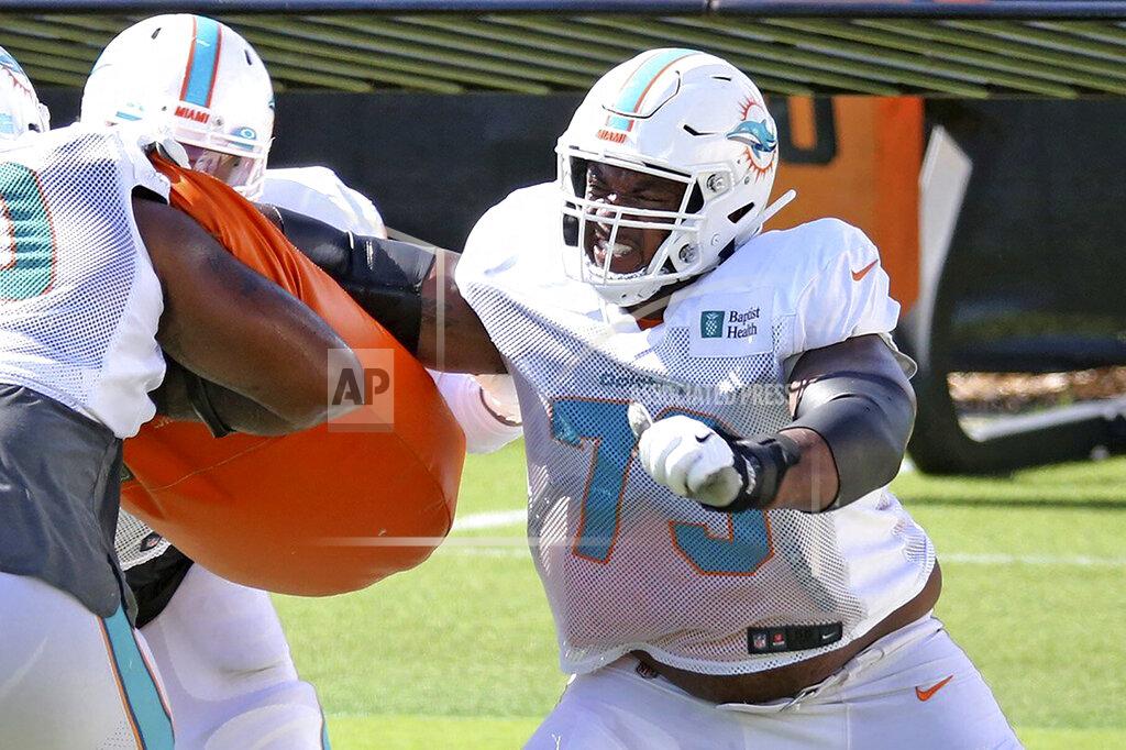 Charles Trainor Jr FILE - Miami Dolphins rookie tackle Austin Jackson (73) runs a drill during NFL football training camp Monday, Aug. 31, 2020, in Miami. At least four Miami Dolphins rookies are expected to see significant action in Sunday’s, Sept. 13 opener. (Charles Trainor Jr./Miami Herald via AP, File)
