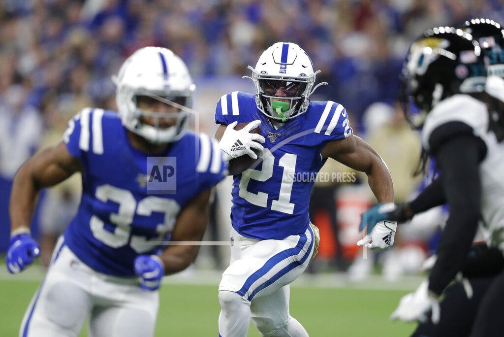 Michael Conroy Indianapolis Colts running back Nyheim Hines (21) runs during the first half of an NFL football game against the Jacksonville Jaguars, Sunday, Nov. 17, 2019, in Indianapolis. (AP Photo/Michael Conroy)