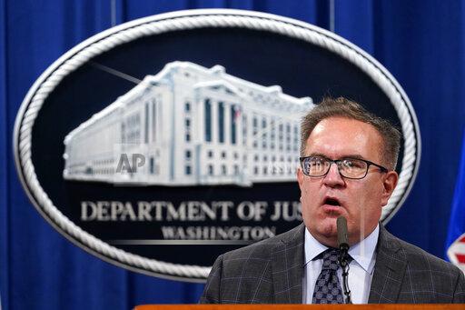 FILE - Environmental Protection Agency (EPA) Administrator Andrew Wheeler speaks, during a news conference at the Justice Department in Washington, on Sept. 14, 2020. Republican Virginia Gov.-elect Glenn Youngkin has tapped the former coal lobbyist and Trump administration Environmental Protection Agency chief to join his cabinet in a role overseeing the state’s environmental policy. Youngkin's transition announced Wednesday, Jan. 5, 2022, that Wheeler is his pick for secretary of natural resources. (AP Photo/Susan Walsh, Pool, File)