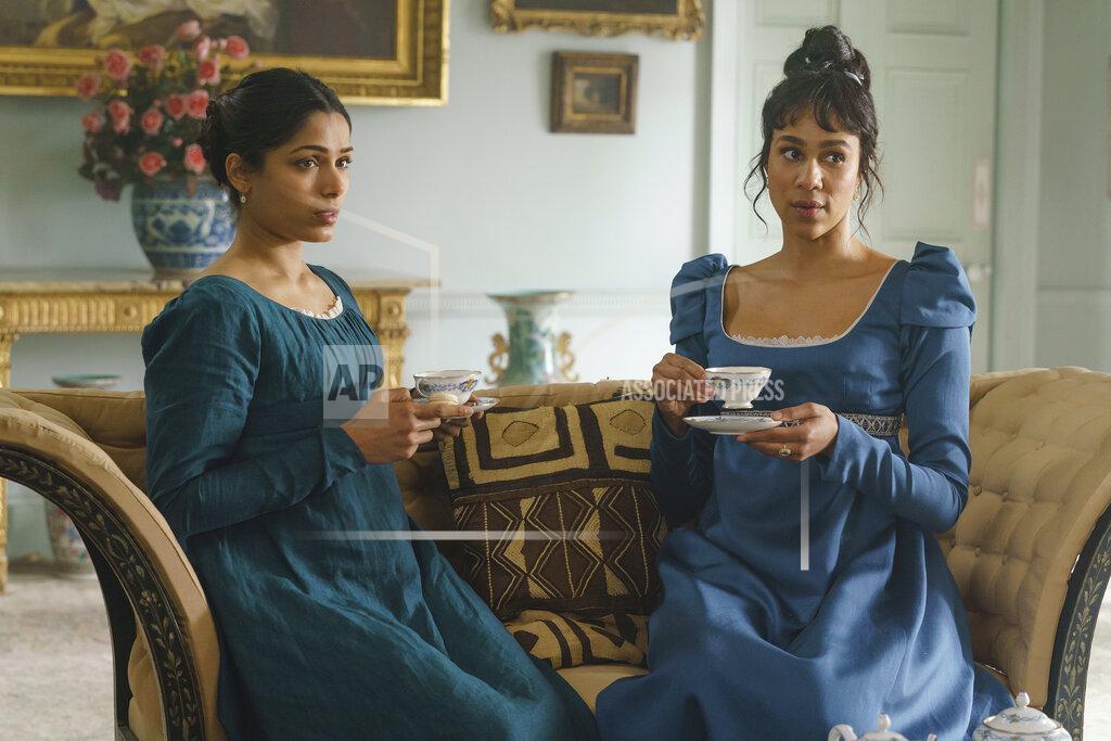 Ross Ferguson This image released by Bleecker Street shows Freida Pinto, left, and Zawe Ashton in a scene from "Mr. Malcolm's List." (Ross Ferguson/Bleecker Street via AP)