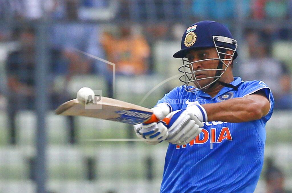 A.m. Ahad FILE - In this Wednesday, June 24, 2015 file photo, Indian cricket captain Mahendra Singh Dhoni plays a shot during the third one-day international cricket match against Bangladesh in Dhaka, Bangladesh. India great Dhoni announced his retirement from international cricket on Saturday, Aug. 15, 2020. Under Dhoni’s stewardship, India won the T20 World Cup in 2007, the 50-over World Cup in 2011 and the Champions Trophy in 2013. (AP Photo/A.M. Ahad, File)
