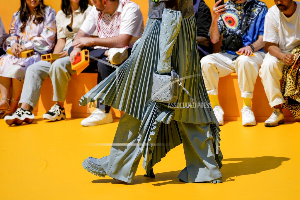 Francois Mori A model wears a creation as part of the Louis Vuitton men's Spring Summer 2023 collection presented in Paris, France, Thursday, June 23, 2022. (AP Photo/Francois Mori)