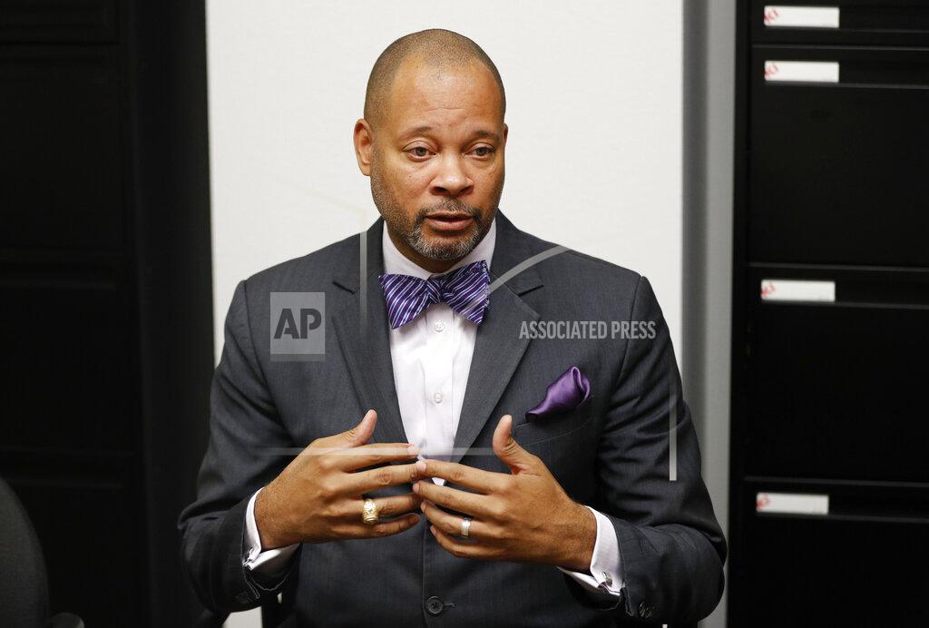FILE - In this Dec. 14, 2018, file photo, Nevada's incoming Attorney General Aaron Ford speaks with The Associated Press in Las Vegas. Attorneys general from 19 other states had recently joined in support of the unusual request from Calvary Chapel Dayton Valley east of Reno. Ford had argued the justices should let the federal court in Reno sort out the details before taking the extraordinary step of wading into the case. (AP Photo/John Locher, File)