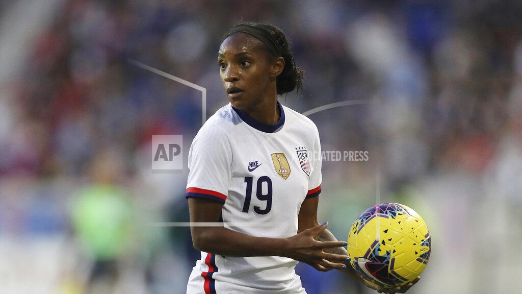 Steve Luciano FILE - United States defender Crystal Dunn (19) looks out before throwing the ball back in during the second half of a SheBelieves Cup soccer match against Spain in Harrison, N.J., in this Sunday, March 8, 2020, file photo. The 28-year-old U.S. national team defender has grown more confident in her abilities and her status on the U.S. women’s national team. She’s also become empowered in her activism as a Black woman. So much so that she even proclaimed herself the "New Crystal Dunn.” (AP Photo/Steve Luciano, File)