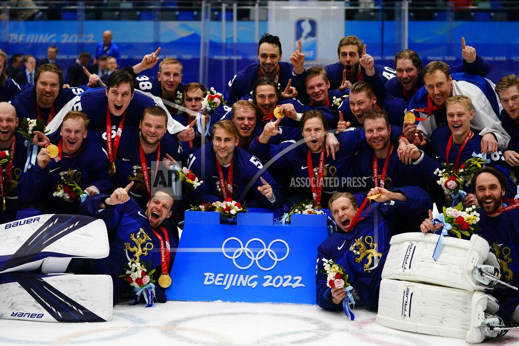 Matt Slocum Finland players celebrate after defeating Russian Olympic Committee in the men's gold medal hockey game at the 2022 Winter Olympics, Sunday, Feb. 20, 2022, in Beijing. (AP Photo/Matt Slocum)