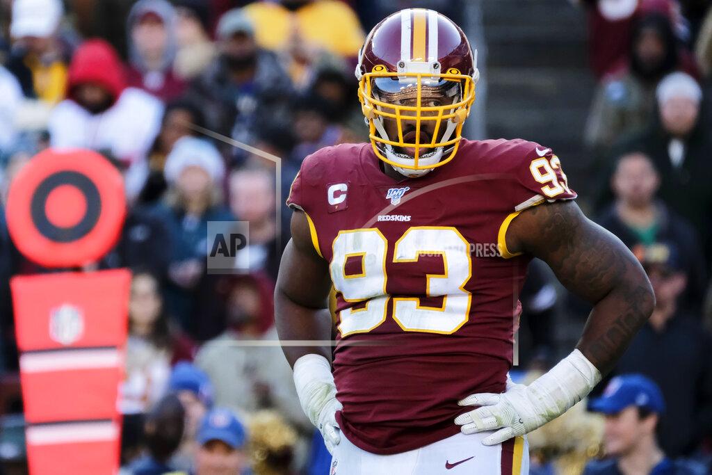 Mark Tenally FILE - In this Dec. 15, 2019, file photo, Washington Redskins defensive end Jonathan Allen stands on the field during an NFL football game against the Philadelphia Eagles in Landover, Md. The Washington Redskins have exercised the fifth-year option on defensive lineman Jonathan Allen's rookie contract. The team announced the expected move Monday, April 27, 2020, in the aftermath of the NFL draft. (AP Photo/Mark Tenally, File)