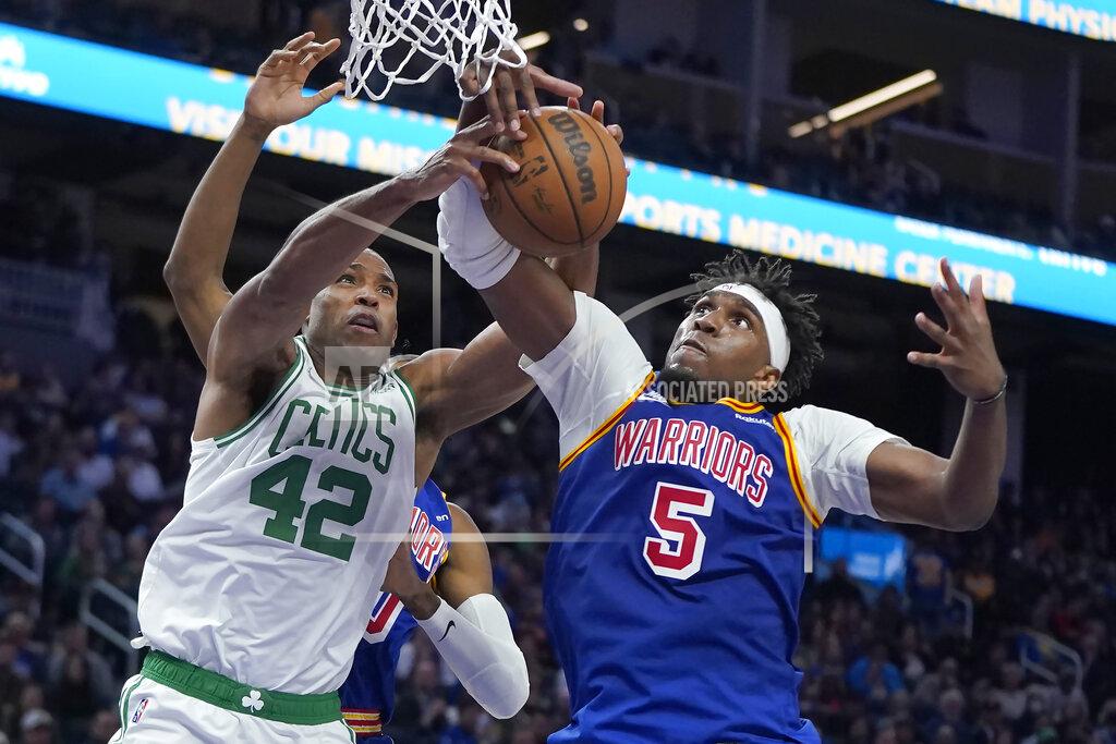 Jeff Chiu FILE - Boston Celtics center Al Horford (42) and Golden State Warriors center Kevon Looney (5) battle for the ball during the second half of an NBA basketball game in San Francisco, Wednesday, March 16, 2022. The NBA's free agency period opens Thursday night, June 30, 2022, with teams and players finally free to negotiate new deals. (AP Photo/Jeff Chiu, File)