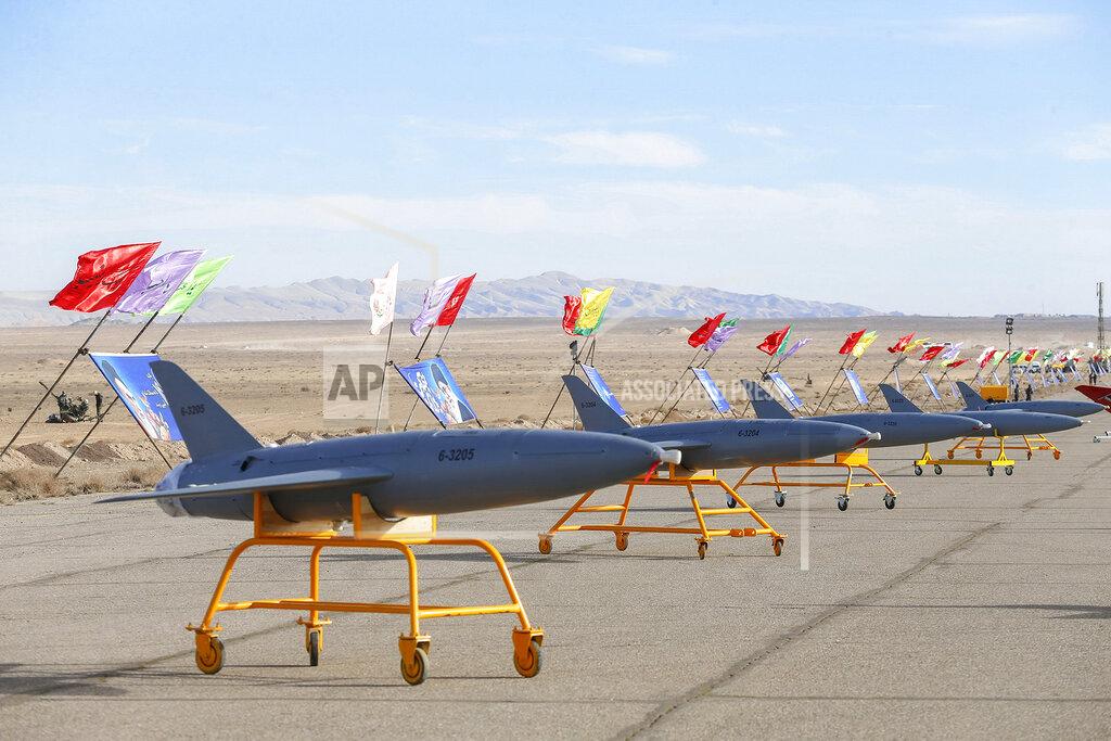 Uncredited In this photo released on Tuesday, Jan. 5, 2021 by the Iranian army, drones are displayed prior to a drill, in an undisclosed location in Iran. The Iranian military began a wide-ranging, two-day aerial rill in the country's north, state media reported, featuring combat and surveillance unmanned aircraft, as well as naval drones dispatched from vessels in Iran's southern waters. (Iranian Army via AP)