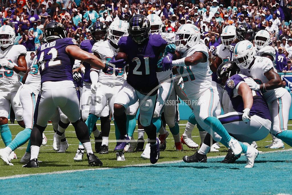 Brynn Anderson Baltimore Ravens running back Mark Ingram (21) scores a touchdown, during the first half at an NFL football game against the Miami Dolphins, Sunday, Sept. 8, 2019, in Miami Gardens, Fla. (AP Photo/Brynn Anderson)