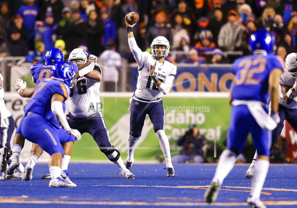 Steve Conner Utah State quarterback Jordan Love (10) throws a pass against Boise State during the first half of an NCAA college football game Saturday, Nov. 24, 2018, in Boise, Idaho. (AP Photo/Steve Conner)