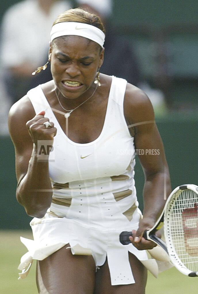 Anja Niedringhaus FILE - Defending champion Serena Williams punches the air on her way to defeating France's Amelie Mauresmo in their women's singles semifinal on the Centre Court at Wimbledon, Thursday July 1, 2004. The 2022 Wimbledon competition is not the first comeback from a significant absence for Williams. (AP Photo/Anja Niedringhaus, File)