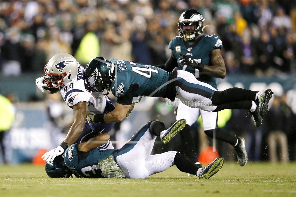 Michael Perez New England Patriots' Benjamin Watson (84) is tackled by Philadelphia Eagles' Nate Gerry (47) and Rodney McLeod (23) during the first half of an NFL football game, Sunday, Nov. 17, 2019, in Philadelphia. (AP Photo/Michael Perez)