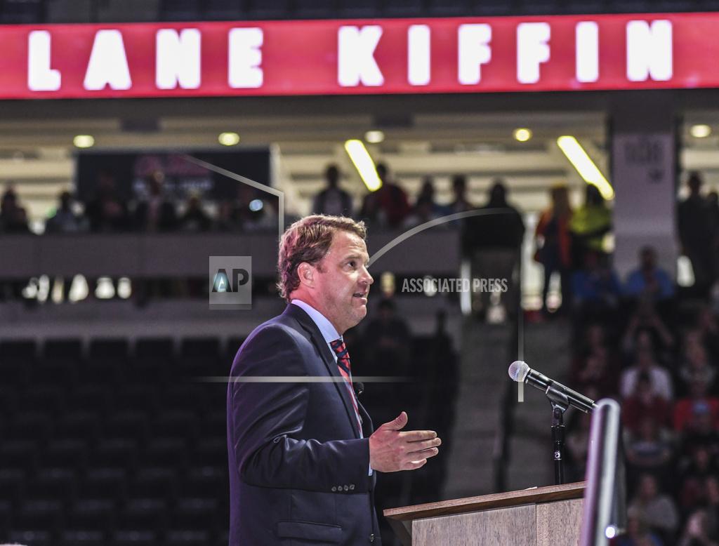 Bruce Newman New Mississippi NCAA college football head coach Lane Kiffin speaks at an introductory press conference in Oxford, Miss., Monday, Dec. 9, 2019. (Bruce Newman, Oxford Eagle via AP)