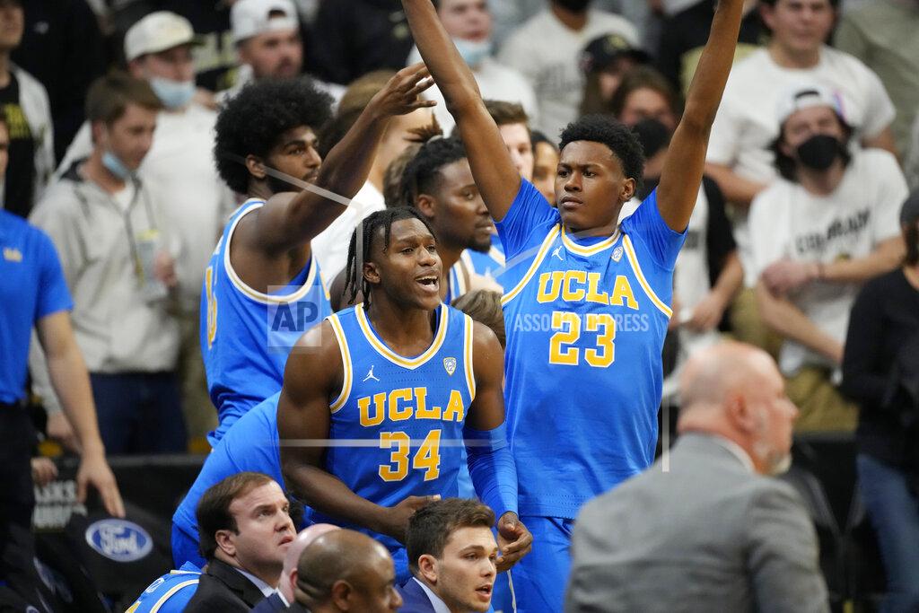 David Zalubowski UCLA guards David Singleton, left, and Peyton Watson celebrate the team's impending win in an NCAA college basketball game against Colorado on Saturday, Jan. 22, 2022, in Boulder, Colo. UCLA won 71-65. (AP Photo/David Zalubowski)