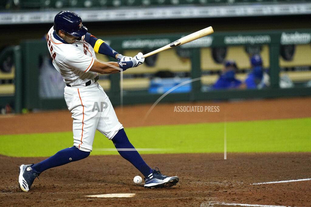 David J. Phillip Houston Astros' Carlos Correa fouls a pitch off his leg during the sixth inning of a baseball game against the Texas Rangers Tuesday, Sept. 15, 2020, in Houston. Correa left the game after the injury. (AP Photo/David J. Phillip)