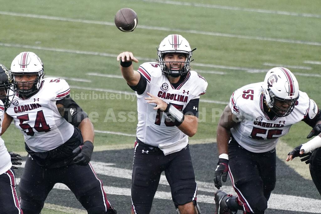 South Carolina quarterback Collin Hill (15) passes against Vanderbilt in the first half of an NCAA college football game Saturday, Oct. 10, 2020, in Nashville, Tenn. (AP Photo/Mark Humphrey)