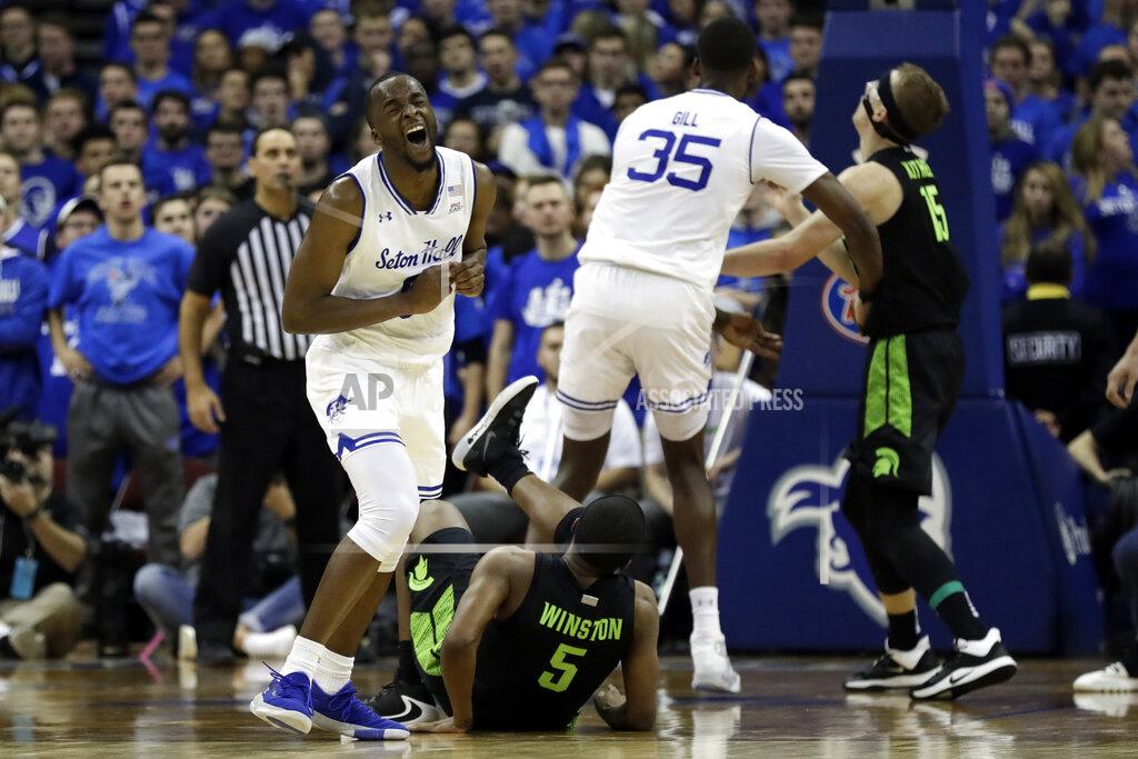 Adam Hunger Seton Hall guard Quincy McKnight reacts after being called for a foul against Michigan State guard Cassius Winston (5) during the second half of an NCAA college basketball game Thursday, Nov. 14, 2019, in Newark, N.J. (AP Photo/Adam Hunger)