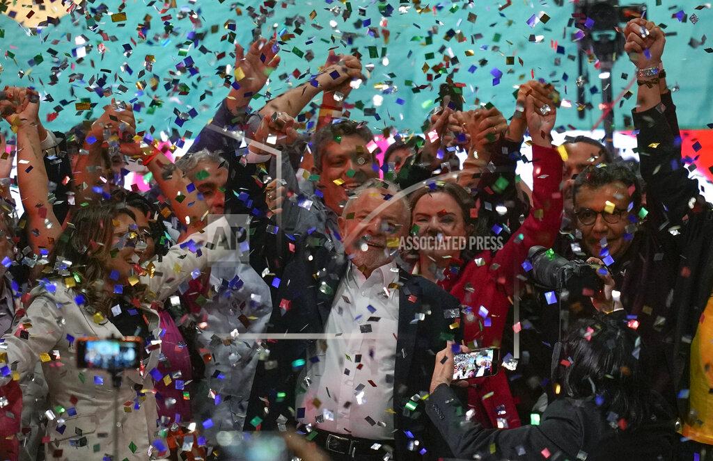 Andre Penner Confetti showers former Brazilian President Luiz Inacio Lula da Silva and supporters after the announcement of his candidacy for the country's upcoming presidential election, in Sao Paulo, Brazil, Saturday, May 7, 2022. Brazil's general elections are scheduled for Oct. 2. (AP Photo/Andre Penner)