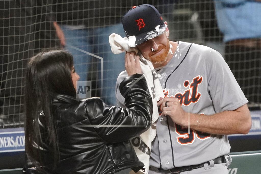 Ted S. Warren Detroit Tigers starting pitcher Spencer Turnbull (56) has shaving cream wiped from his face by an unidentified woman after he threw a no-hitter in the team's baseball game against the Seattle Mariners, Tuesday, May 18, 2021, in Seattle. The Tigers won 5-0. (AP Photo/Ted S. Warren)