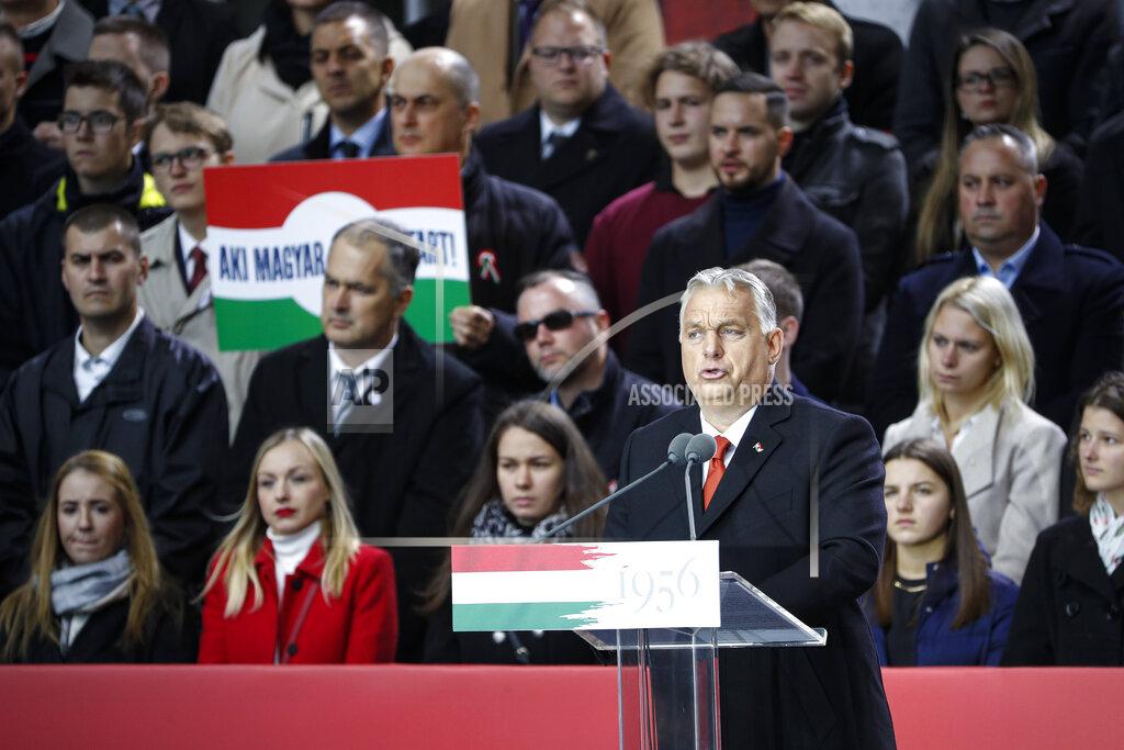 Laszlo Balogh Hungarian Prime Minister Viktor Orban addresses supporters during celebration the 65th anniversary of the 1956 Hungarian revolution, in Budapest, Hungary, Saturday, Oct. 23, 2021. Thousands of supporters of Prime Minister Viktor Orban, who is expected to deliver a speech marking the 65th anniversary of the 1956 Hungarian revolution, march in Budapest, Hungary to demonstrate loyalty to his right-wing government. (AP Photo/Laszlo Balogh)