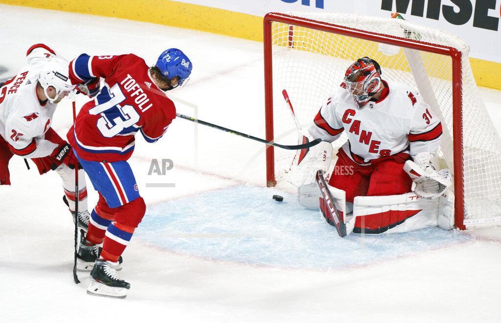 Paul Chiasson Montreal Canadiens' Tyler Toffoli scores past Carolina Hurricanes goaltender Frederik Andersen during the second period of an NHL hockey game Thursday, Oct. 21, 2021, in Montreal. (Paul Chiasson/The Canadian Press via AP)