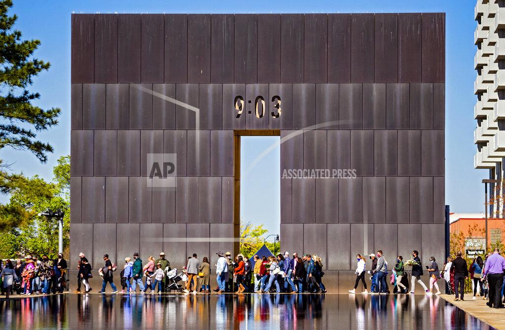 Chris Landsberger Survivors, friends and family members gather during the 26th Anniversary Remembrance Ceremony at the Oklahoma City National Memorial and Museum in Oklahoma City, Okla on Monday, April 19, 2021. (Chris Landsberger/The Oklahoman via AP)