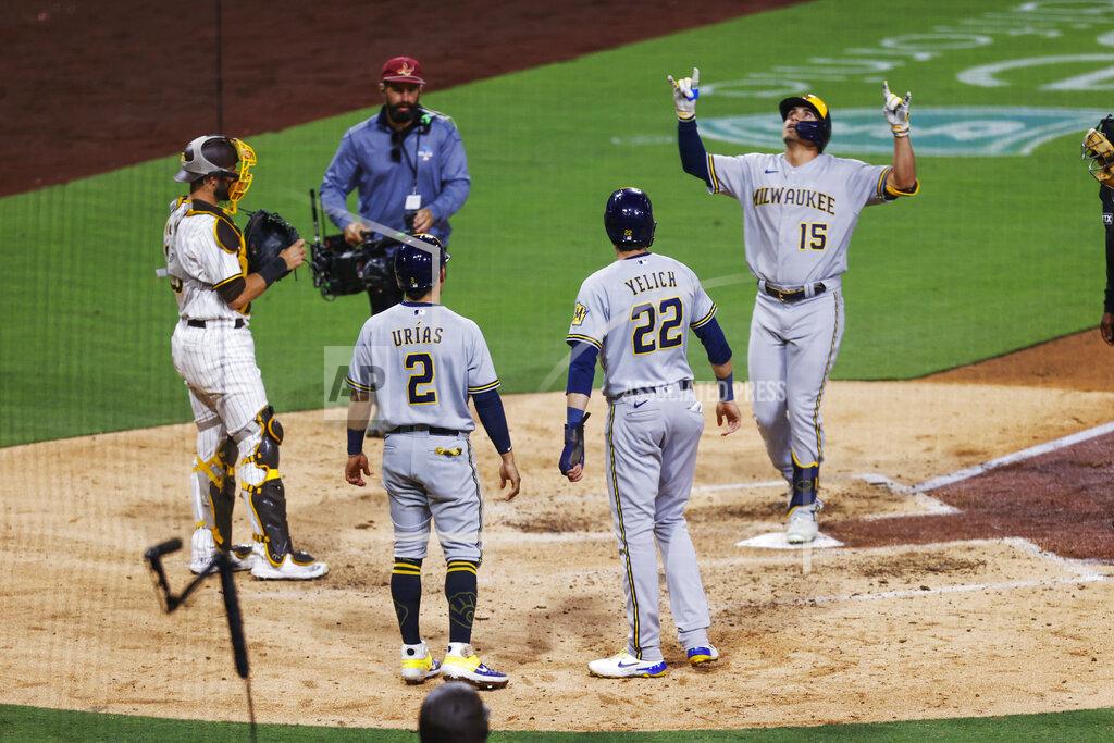 Mike Mcginnis Milwaukee Brewers' Tyrone Taylor celebrates after hitting a three-run home run that scored Christian Yelich (22) and Luis Urias (2) against the San Diego Padres during the sixth inning of a baseball game Tuesday, May 24, 2022, in San Diego. (AP Photo/Mike McGinnis)