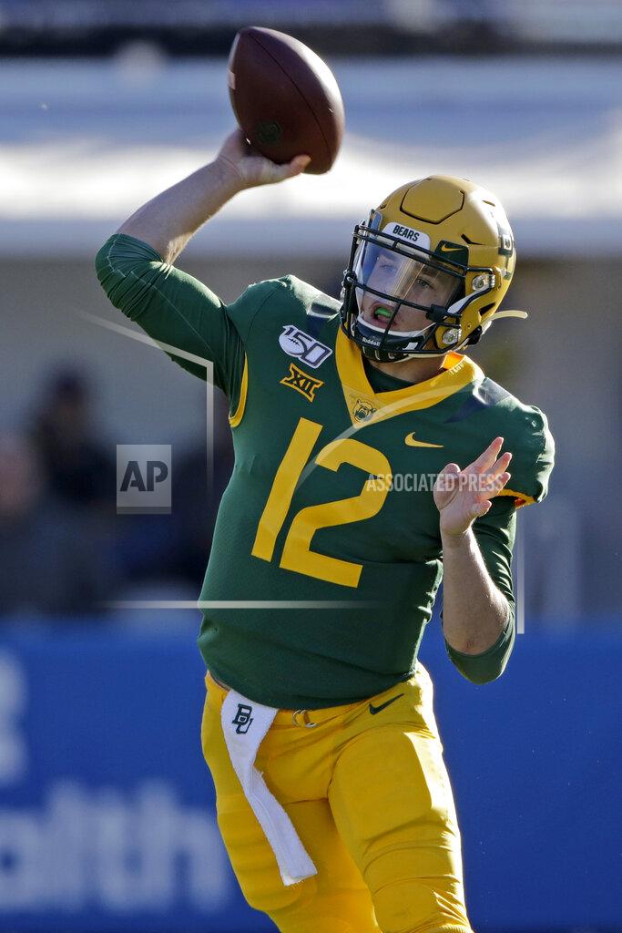 Charlie Riedel Baylor quarterback Charlie Brewer throws the ball during the first half of an NCAA college football game against Kansas, Saturday, Nov. 30, 2019, in Lawrence, Kan. (AP Photo/Charlie Riedel)