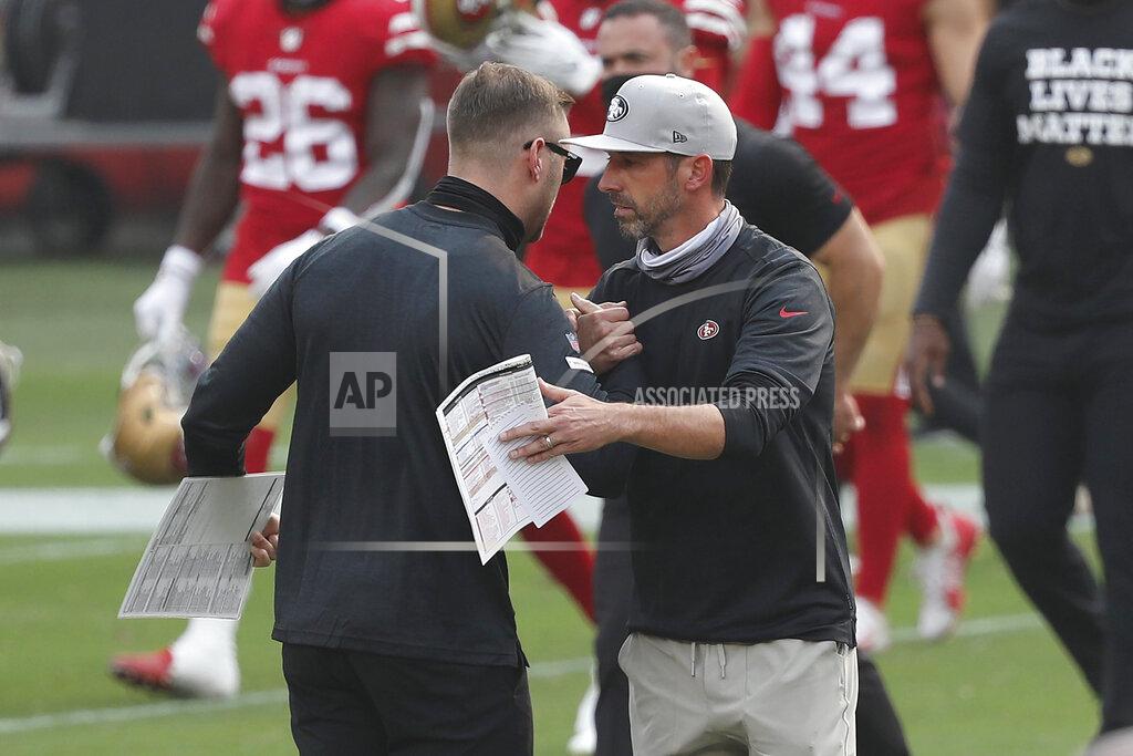 Josie Lepe Arizona Cardinals head coach Kliff Kingsbury, left, greets San Francisco 49ers head coach Kyle Shanahan after an NFL football game in Santa Clara, Calif., Sunday, Sept. 13, 2020. (AP Photo/Josie Lepe)
