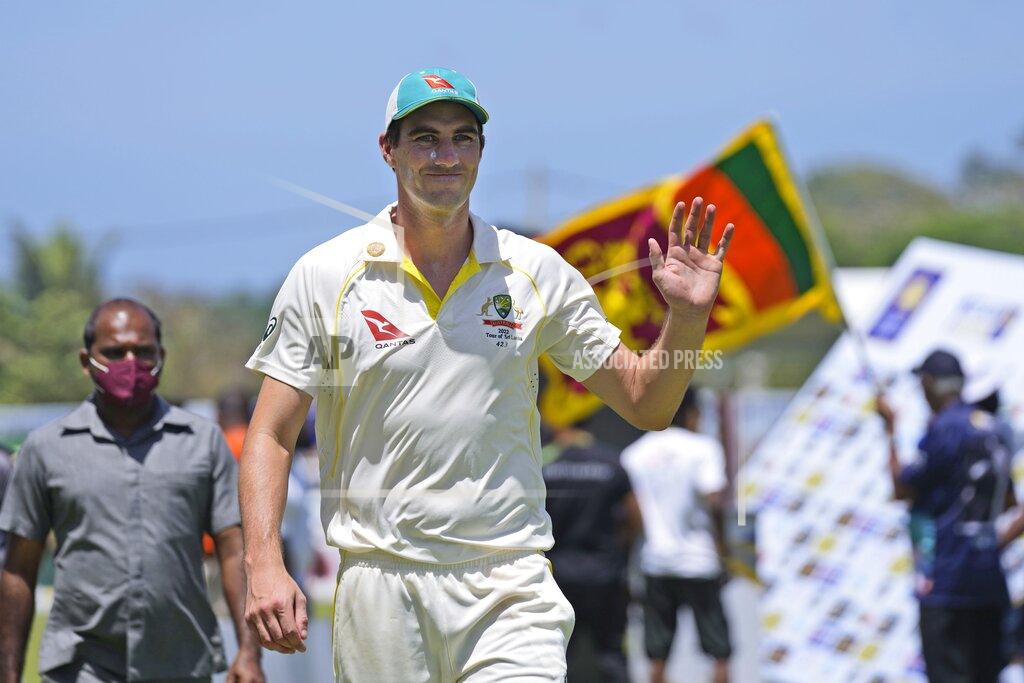 Eranga Jayawardena Australia's cricket captain Pat Cummins waves to fans after defeating Sri Lanka by ten wickets win in day three of the first test cricket match between Australia and Sri Lanka in Galle, Sri Lanka, Friday, July 1, 2022. (AP Photo/Eranga Jayawardena)