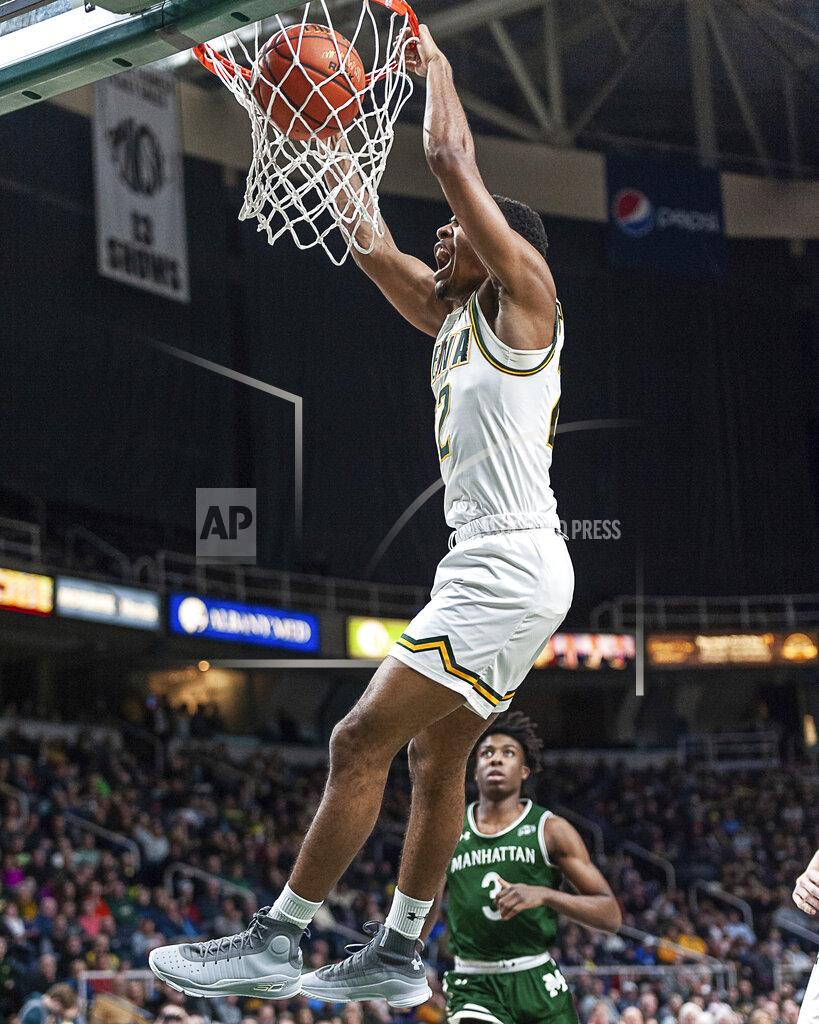 Rob Simmons In this Jan. 27, 2019 photo provided by Siena College, Siena point guard Jalen Pickett dunks during Siena's NCAA college basketball game against Manhattan at Siena College in Loudonville, N.Y. Pickett, who averages 15.5 points and leads the MAAC with 6.4 assists per game, has helped lead Siena into contention for the Metro Atlantic Athletic Conference regular-season title. (Rob Simmons/Siena College via AP)