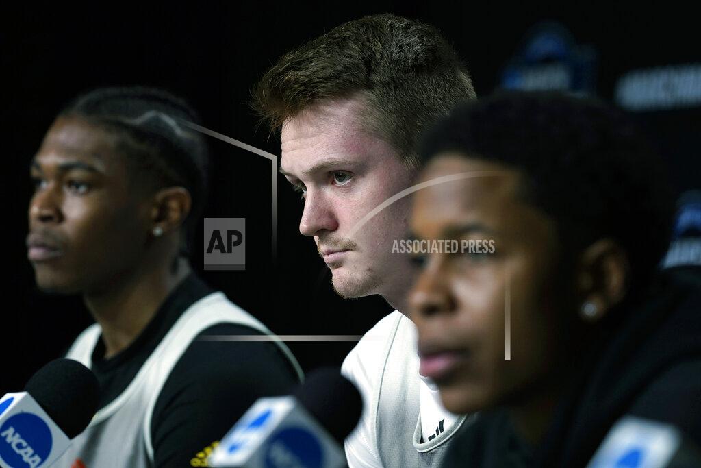 Nam Y. Huh Miami forward Sam Waardenburg, center, listens to a question during a news conference at the NCAA men's college basketball tournament Thursday, March 24, 2022, in Chicago. Miami faces Iowa State in a Sweet 16 game on Friday. (AP Photo/Nam Y. Huh)