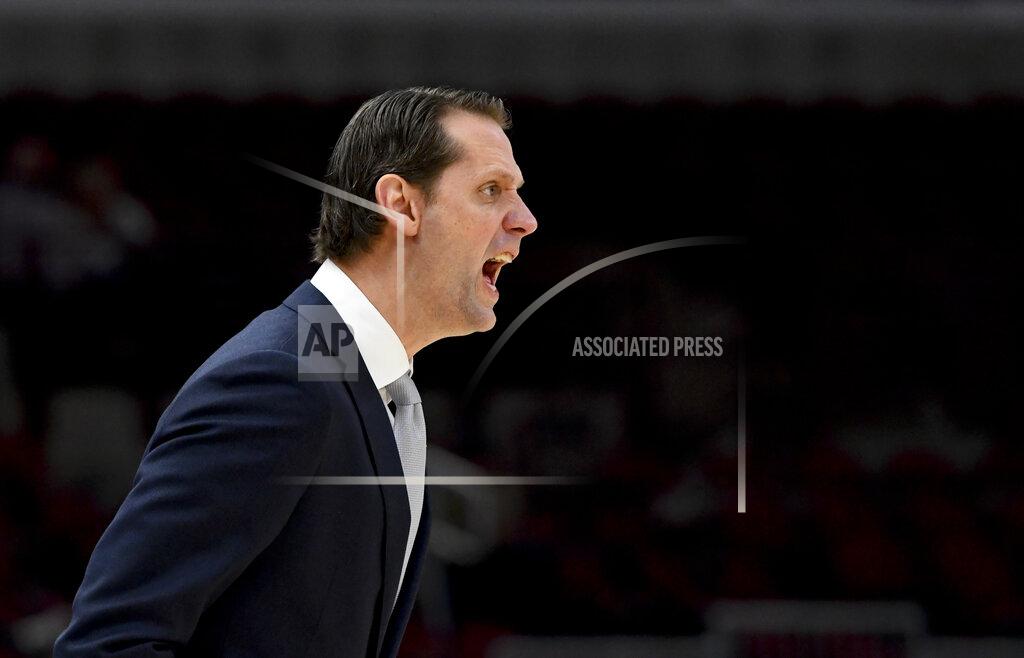 Matt Marton Cincinnati coach John Brannen shouts to his team during the first half of an NCAA college basketball game against Iowa, Saturday, Dec. 21, 2019, in Chicago. (AP Photo/Matt Marton)
