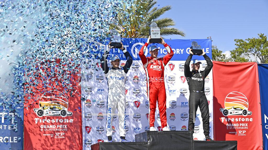 Steve Nesius Drivers Alex Palou, second place, from left to right, Scott McLaughlin, winner, and Will Power, thirds place, celebrate at the end of the Grand Prix of St. Petersburg Sunday, Feb.27, 2022, in St. Petersburg, Fla. (AP Photo/Steve Nesius)